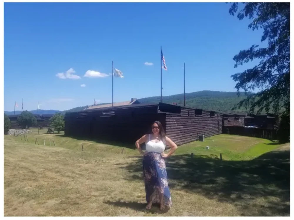 Tina O’Brien standing outside Fort William Henry in Lake George, New York.
