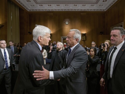 Robert F. Kennedy, Jr., right, President Donald Trump's nominee to serve as Secretary of Health and Human Services,talks with Committee Chairman Sen. Bill Cassidy, R-La., following his testimony during a Senate Committee on Health, Education, Labor and Pensions hearing for his pending confirmation on Capitol Hill, Thursday, Jan. 30, 2025, in Washington. (AP Photo/Rod Lamkey, Jr.)