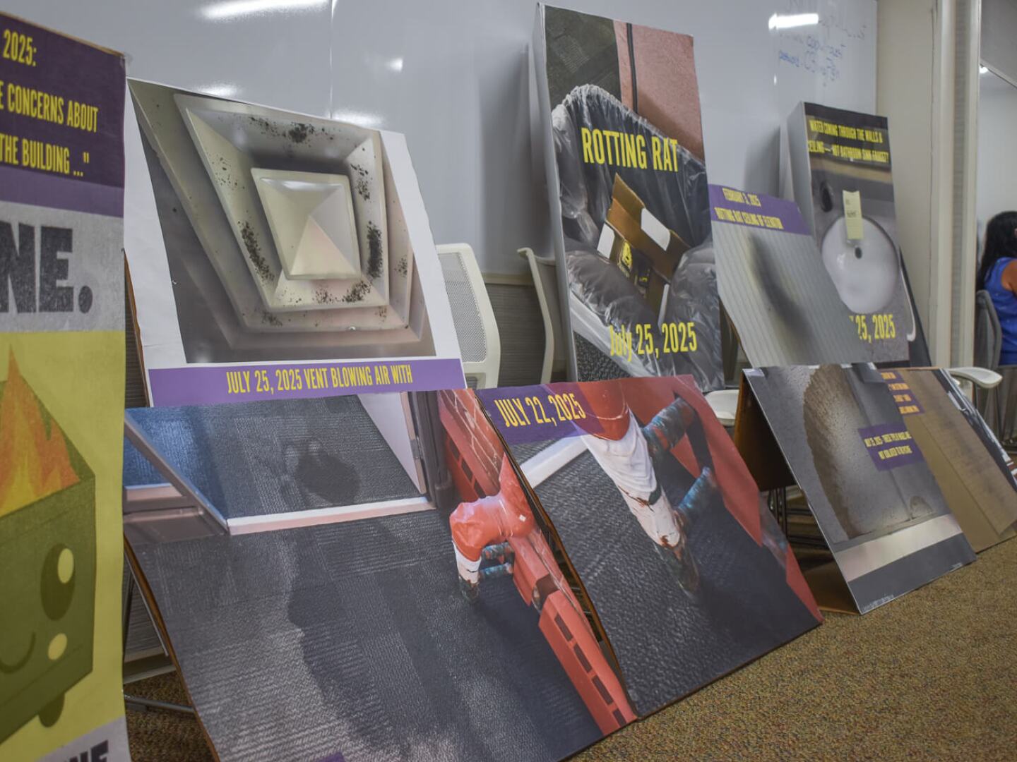 Photographs by union workers inside the Rhode Island Department of Children, Youth and Families Providence headquarters are on display at the State Properties Committee meeting on Tuesday, July 29, 2025.